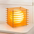 Lampa Stołowa Nowoczesna z Geometryczną Konstrukcją i Kulą Świetlną - Pomarańczowy