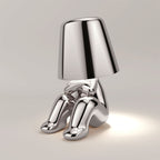 Lampa Stołowa Designerska Figurka - Plądrujący Srebrny