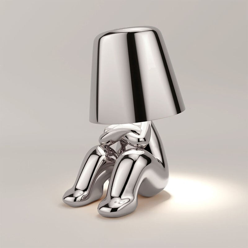 Lampa Stołowa Designerska Figurka - Plądrujący Srebrny