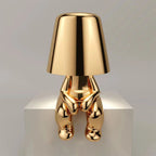 Lampa Stołowa Designerska Figurka - Siedzący Złoty