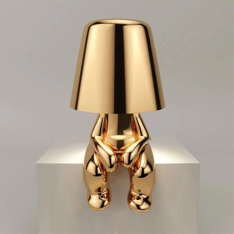 Lampa Stołowa Designerska Figurka - Siedzący Złoty
