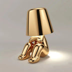 Lampa Stołowa Designerska Figurka - Plądrujący Złoty